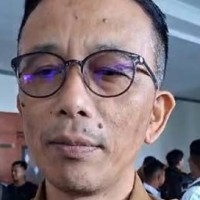 DR. Budi Alimudin, M.Si, MH